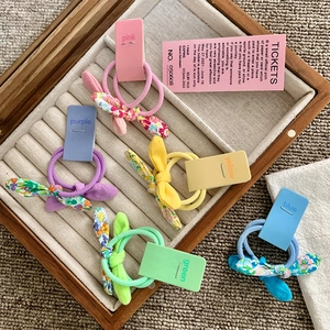 Five-pack set of cute floral bunny ear hair ties for girls in various pastel colors