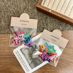Colorful glitter star hair clips set in pink, purple, blue and orange for girls