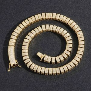 Close-up of 10mm golden hip hop link chain with micro-paved cubic zirconia and secure clasp