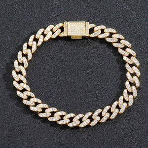 Close-up of 9mm gold-plated Cuban link necklace with micro-pave cubic zirconia clasp