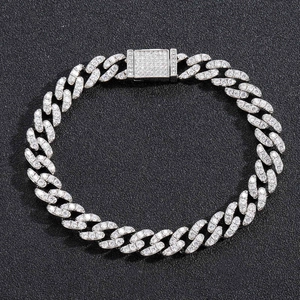 Macro shot of a 9mm silver Hip Hop Cuban chain with micro-pave cubic zirconia crystals
