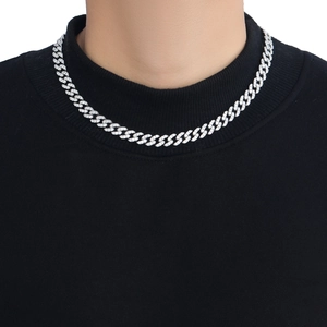Detailed view of 9mm silver iced out Cuban link chain with micro-paved zircon stones