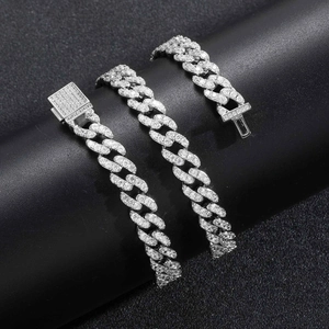 Macro shot of 9mm Cuban link chain with micro-pave zircons and square pressure clasp