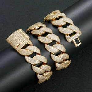 Close-up of 22mm gold Cuban link chain with detailed five-row zircon micro-pave setting