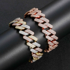 Close-up of 20mm iced out Miami Cuban link bracelets in tri-color and rose gold finishes