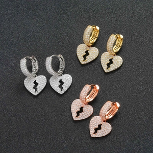 Boucles d'oreilles cœur éclair serties de zircons en finitions or, argent et or rose