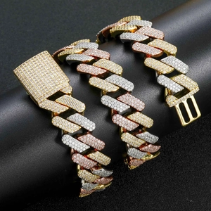 Close-up of hip hop tri-color Miami Cuban link chain with paved white zircon stones