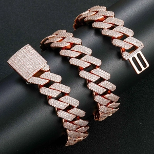 Close-up of rose gold iced out Miami Cuban chain with micro-pave diamond setting