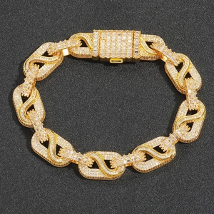Pulsera hip hop chapada en oro con eslabones en S y circonitas cúbicas brillantes