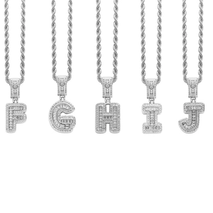 Detail view of iced out alphabet pendants F to J with silver rope chain for hip hop style