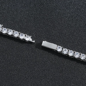 Macro detail of high-quality cubic zirconia tennis chain with secure buckle closure