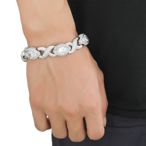 Macro detail of silver hip hop Cuban chain with micro-paved diamonds and eye-shaped links