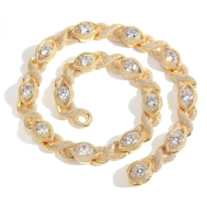 Golden hip hop Cuban link necklace with eye-shaped motifs and micro-paved zircons