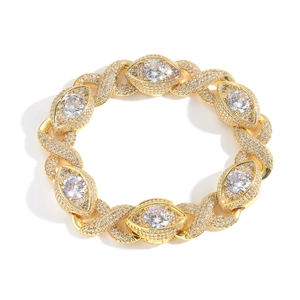 15mm gold Cuban link bracelet featuring evil eye infinity charms and pavé cubic zirconia