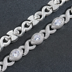 Macro shot of 15mm infinity link and marquise zircon micro-pave Cuban bracelet