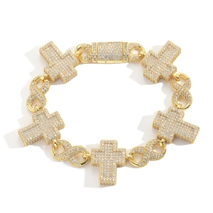 Iced out gold hip hop bracelet with cross and infinity symbols and zircon pavé