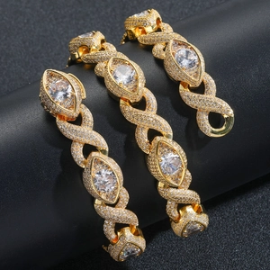 Macro shot of gold hip hop Cuban chain with infinity links and micro-pave zircons