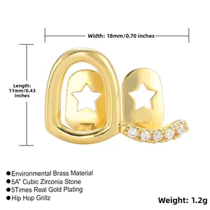 Macro shot of 18k gold plated hip hop grillz with hollow star and zircon inlay