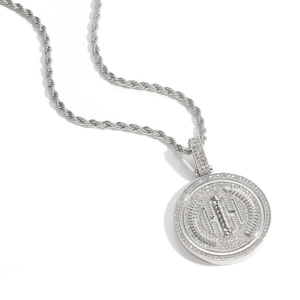 Close-up of silver hip hop rotating medal pendant with zircons and barber pole icon