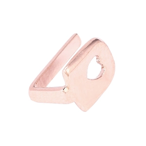 Detailed view of rose gold hip hop single tooth cap with geometric hollow heart design