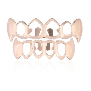 Hip hop rose gold vampire grillz set for top and bottom teeth with hollow fang design