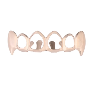 Front view of rose gold vampire fangs grillz with six-tooth hollow design and polished finish