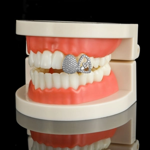 Hip hop silver grillz set with zircon inlays featuring heart arrow and teardrop designs