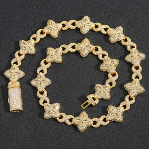 Iced out gold infinity clover necklace and bracelet set with 5A cubic zirconia stones