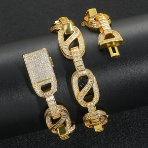 Macro shot of hip-hop chain with pave crystals and gold plated square buckle