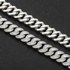 Macro view comparing polished silver finish and iced out pave CZ Cuban link bracelets