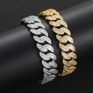Detail of 15mm iced out Miami Cuban link bracelets with T-shaped cubic zirconia in gold and silver
