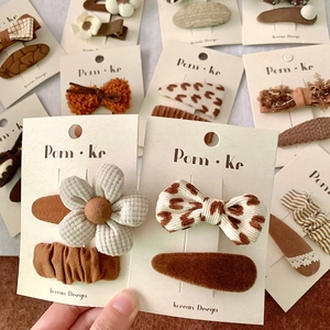 Korean style floral and bow hair clip set in coffee tones for girls on display cards