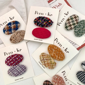 Vintage oval wool fabric hair clip set with houndstooth and tweed texture