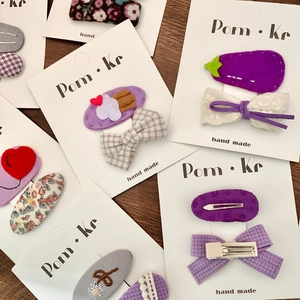 Handmade purple cartoon animal and floral bow hair clip set for kids on card