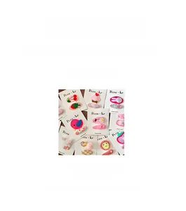 Détail des barrettes en tissu rose de 6cm avec broderie animale et dimensions