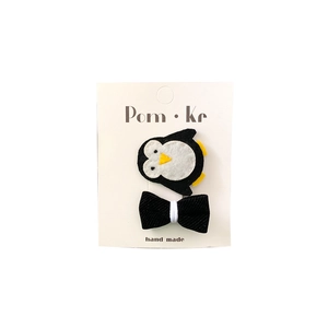 Handgefertigte Haarklammern mit Pinguin-Motiv und schwarzer Schleife für Babys
