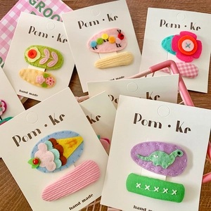 Handgefertigte Filz-Haarklammern für Kinder mit Cartoon-Dinosaurier- und Blumenmotiven