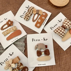 Handmade Korean style bow and flower hair clip set in warm brown and cream tones