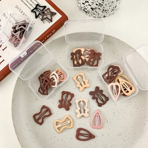 10-piece Korean style matte Earth tone hair clip set with stars and hearts in a storage box