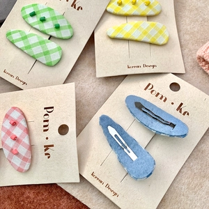 Set of pastel plaid fabric oval hair clips with beads on a branded Korean Design card