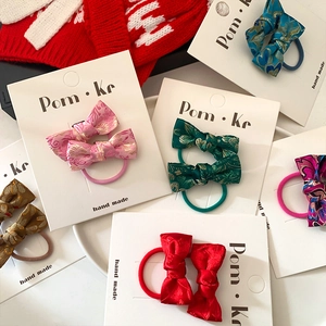Traditional Chinese style brocade bow hair clips set with colorful floral patterns