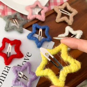 Fermagli per capelli a forma di stella in lana lavorata a maglia in colori assortiti
