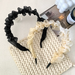Elegant mesh pleated headbands in black and champagne gold with voluminous organza fabric