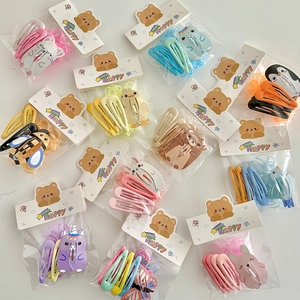 Detailed set of cute cartoon resin hair clips and elastic bands in pastel macaron colors
