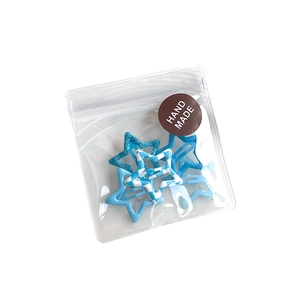 Set de pinzas para el pelo con forma de estrella con patrones de cuadros azules y purpurina