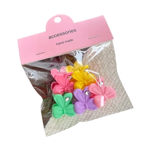 Matte butterfly mini hair claw clip set for girls in vibrant assorted candy colors