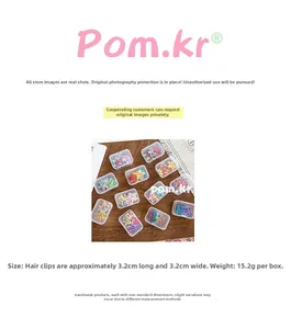 Detail view of colorful star hair clips in 3.2cm size with clear plastic storage box
