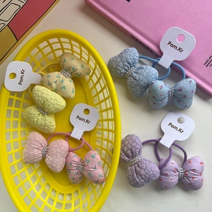 Set de gomas para el pelo con lazos florales y perlas en amarillo, azul, púrpura y rosa