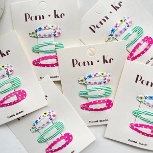Lot de 3 barrettes BB à bords ondulés avec motifs floraux, rayures et pois