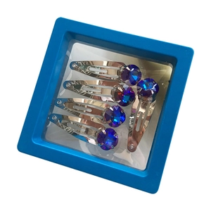 Set de 5 barrettes argentées en forme de goutte avec strass bleus en boîte cadeau